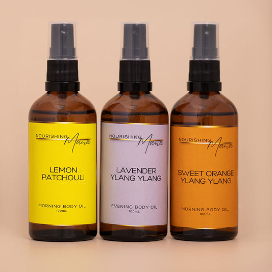 Three Nourishing Mana botanical body oils bundled together, featuring Lavender Ylang Ylang, Lemon Patchouli and Sweet Orange Ylang Ylang Body Oils.